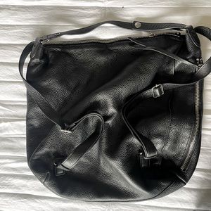 Womens universal purse ( backpack or throw over the shoulder)